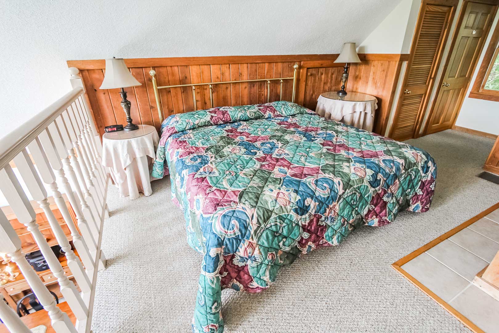 A cozy master bedroom at VRI's Alpine Crest Resort in Georgia.